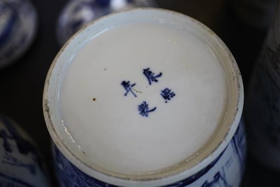 A pair of Chinese blue and white baluster jars and covers, late 19th century 28.5cm, both repaired